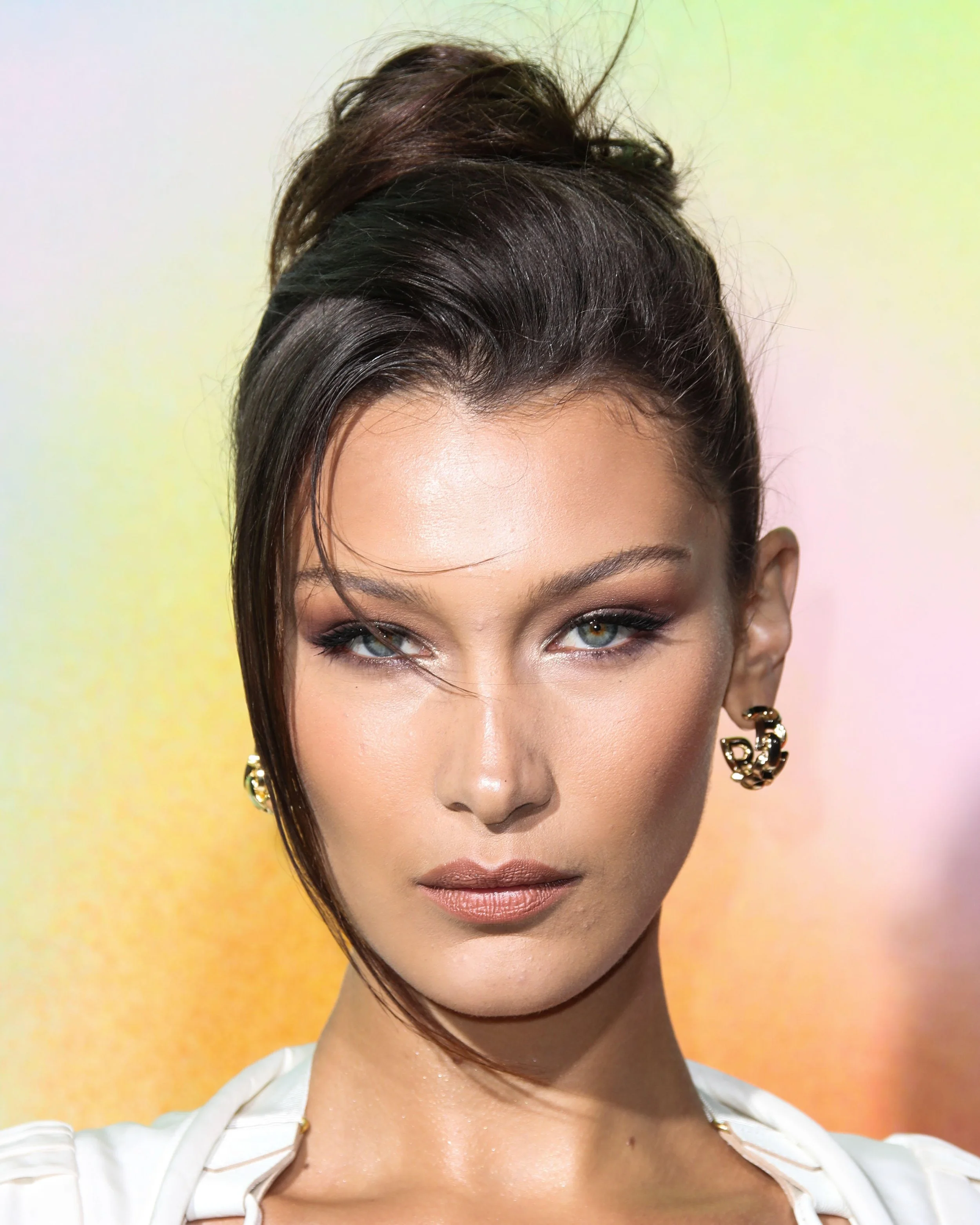 Bella Hadid — often associated with the slim, V-shaped facial ideal after buccal fat removal